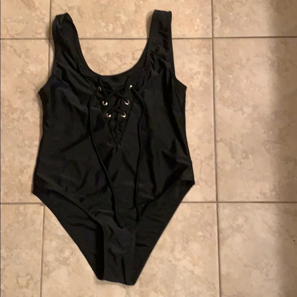 Girls crossed black swimsuit